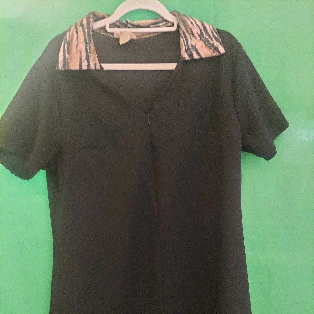 marisa black dress with front zipper and leopard print